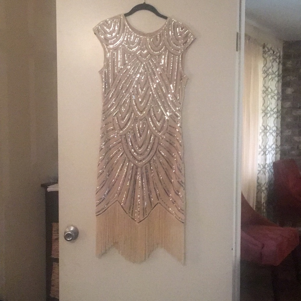 Sequence dress size L, 100%  polyester.
